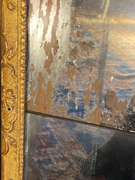 Miroir de boiserie début XVIII avec baguette bérain miroir et plancher d’origine