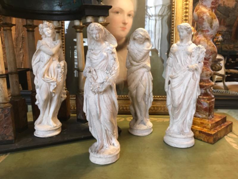 Suite de 4 statuettes d’atelier représentant les 4 saisons en plâtre d’époque XIX ème